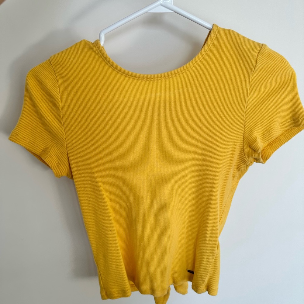 yellow hollister crop top with open back